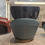 Dusty Blue Leather Lounge Chair with Elevated Headrest and High-Gloss Dark Back Panel